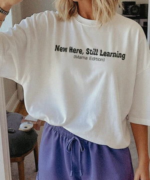 New Here Still Learning Mama Edition Shirt – New Mom Comfort Colors® Tee or Sweatshirt - Woven Mama