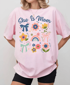She Is Mom Comfort Colors® T-Shirt – Floral & Bow Inspirational Mom Shirt - Woven Mama