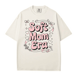 Soft Mom Era Comfort Colors® T-Shirt – Pink Bubble Letters with Hearts, Ribbons & Bows Mom Shirt - Woven Mama