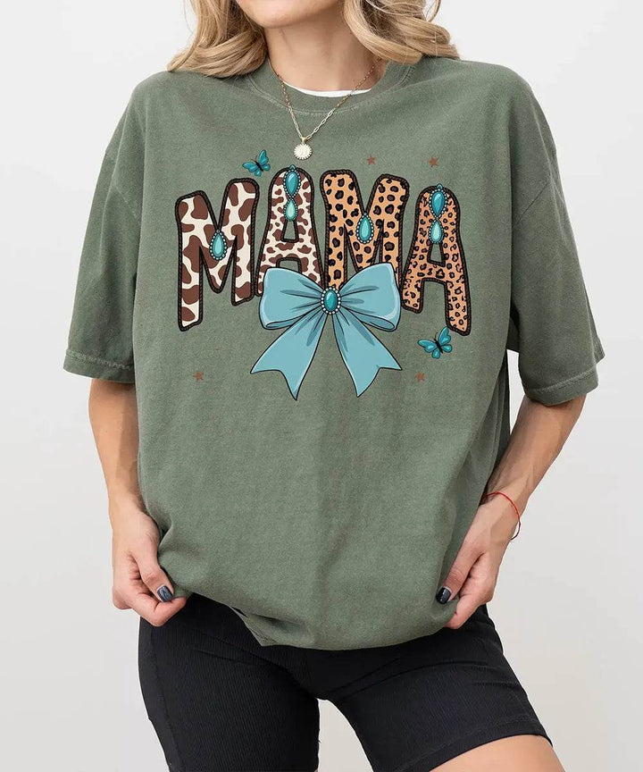 MAMA Comfort Colors® T-Shirt – Leopard & Cow Print Letters with Turquoise Bow Mom Shirt - Woven Mama