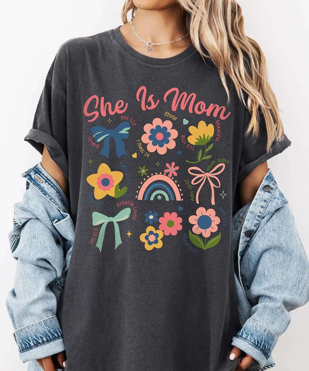 She Is Mom Comfort Colors® T-Shirt – Floral & Bow Inspirational Mom Shirt - Woven Mama