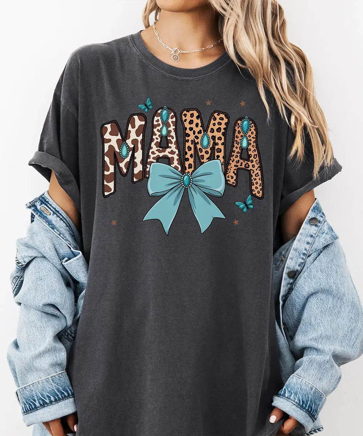 MAMA Comfort Colors® T-Shirt – Leopard & Cow Print Letters with Turquoise Bow Mom Shirt - Woven Mama