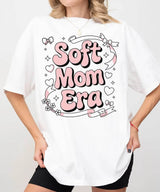 Soft Mom Era Comfort Colors® T-Shirt – Pink Bubble Letters with Hearts, Ribbons & Bows Mom Shirt - Woven Mama