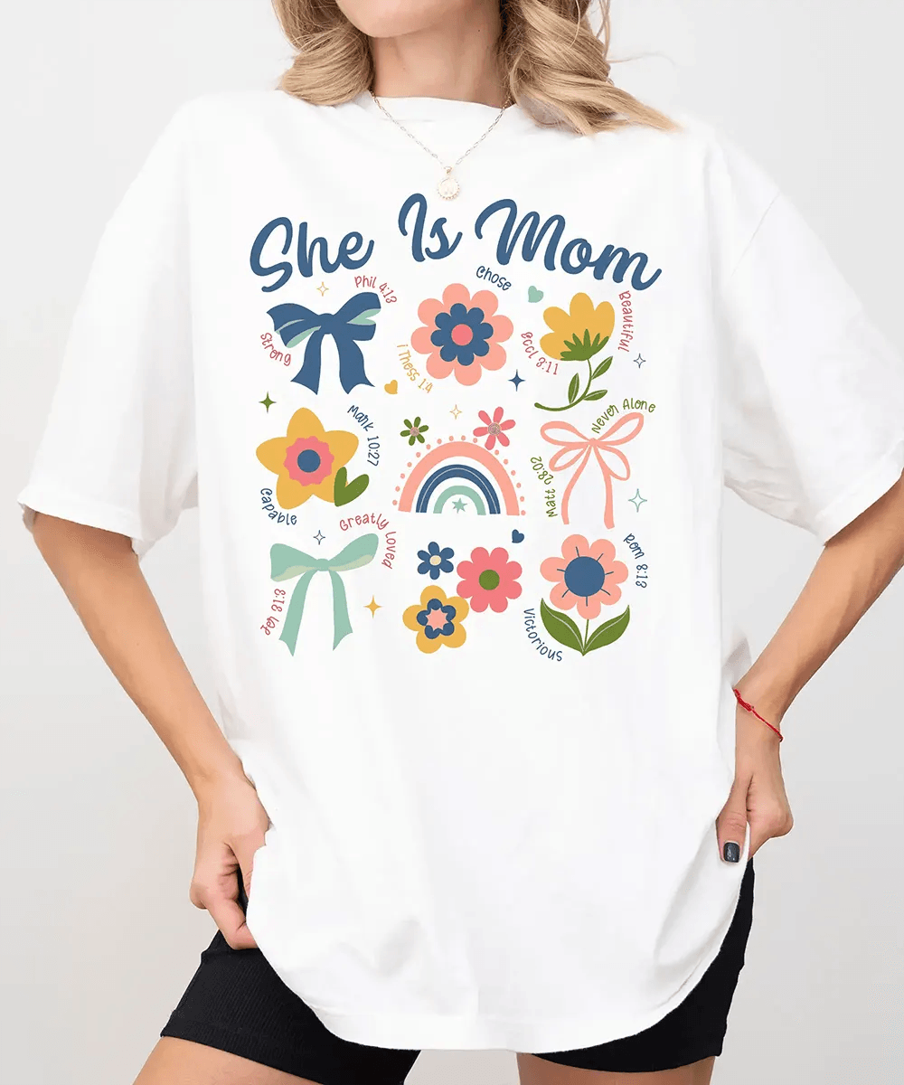 She Is Mom Comfort Colors® T-Shirt – Floral & Bow Inspirational Mom Shirt - Woven Mama