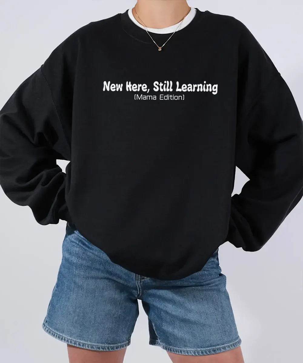 New Here Still Learning Mama Edition Shirt – New Mom Comfort Colors® Tee or Sweatshirt - Woven Mama