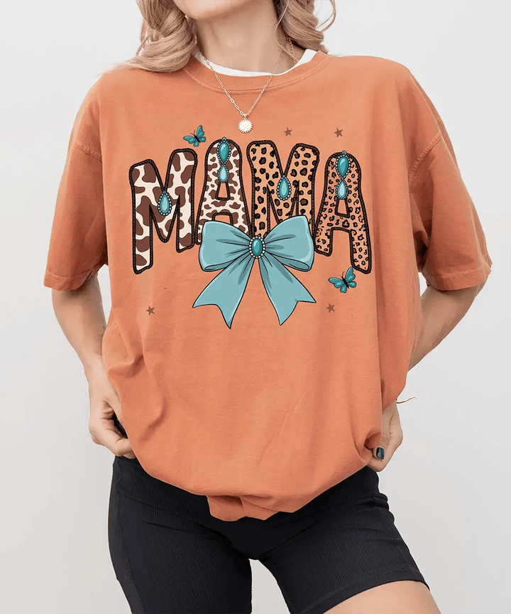 MAMA Comfort Colors® T-Shirt – Leopard & Cow Print Letters with Turquoise Bow Mom Shirt - Woven Mama